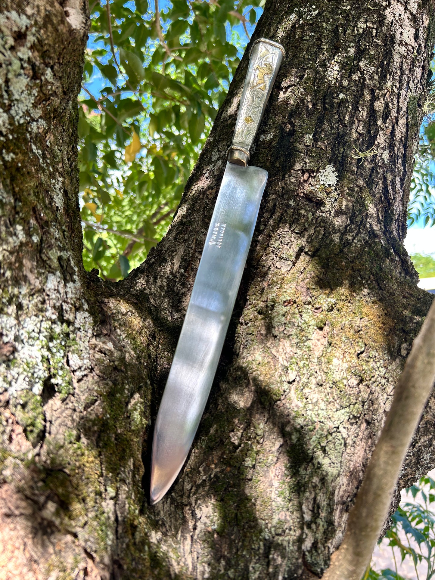 Faca de flores de alpaca e bronze