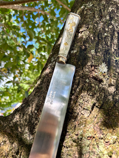 Faca de flores de alpaca e bronze