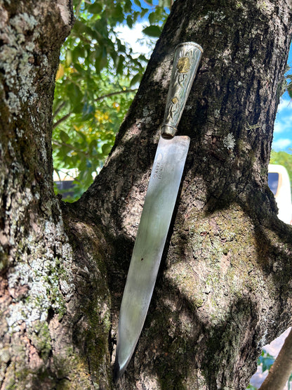 Faca de flores de alpaca e bronze