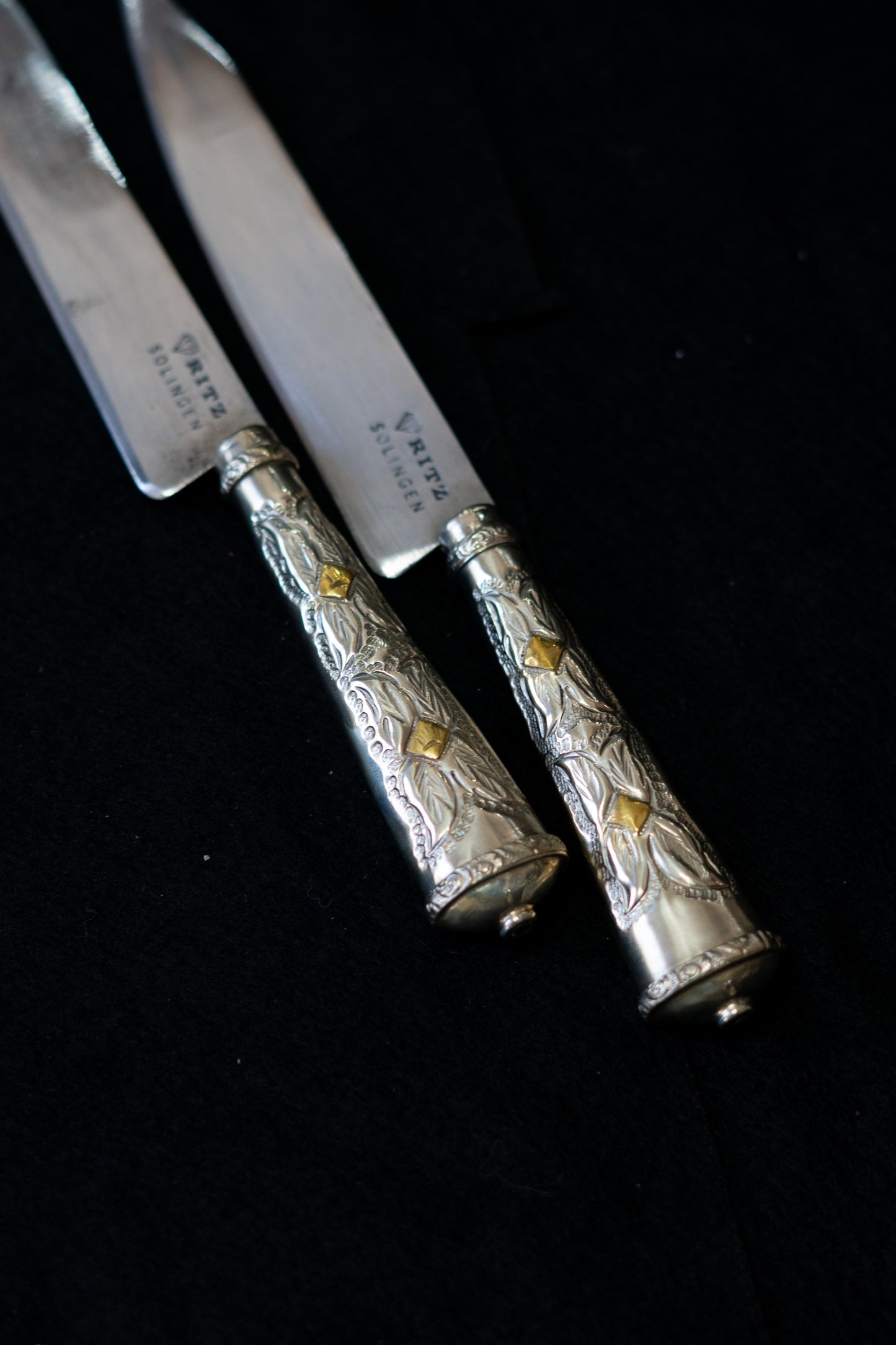 Faca de flores de alpaca e bronze